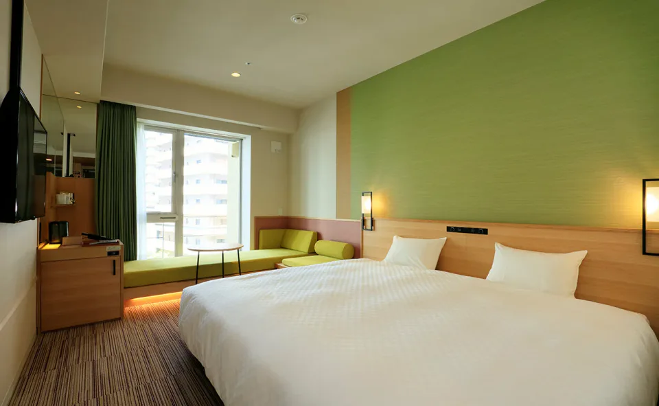 THE SINGULARI HOTEL Executive Deluxe King room with a raised sofa