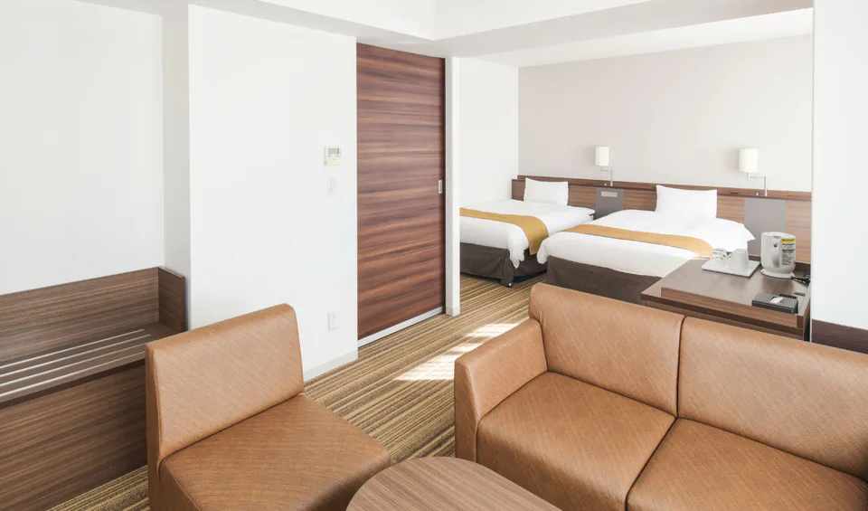 ห้องพักและพื้นที่เตียงของ Vessel Inn Sapporo Nakajima Park